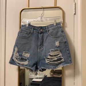 Distressed denim shorts